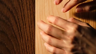 Gentle tapping on wooden surfaces